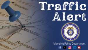 A graphic showing a close-up map with a blue pushpin marking the city of Memphis. On the right side, large white distressed text reads “Traffic Alert” against a dark blue background. Below the text is the official seal of the Memphis Police Department. At the bottom right, the words “Memphis Police Department” appear above icons for Facebook, X, Instagram, LinkedIn, and YouTube.