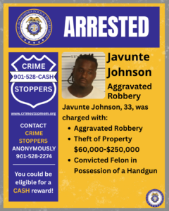 A rectangular poster with a blue and yellow color scheme. At the top, there is a blue banner with the word “ARRESTED” in large white letters. To the left of this banner is a circular seal labeled “City of Memphis Police Department.” Below the banner, on the left side of the poster, there is a large blue shield-shaped graphic with white text that reads “CRIME STOPPERS 901-528-CASH.” Beneath it is the website “www.crimestopmem.org.” Further text below reads: “CONTACT CRIME STOPPERS ANONYMOUSLY 901-528-2274” and “You could be eligible for a CASH reward!” To the right of the shield graphic, there is a square photo of one individual taken against a height chart background. The photo is presented without identifying or describing this individual beyond what appears in the written text on the poster. To the right of the photo, black text reads: “Javunte Johnson Aggravated Robbery Javunte Johnson, 33, was charged with: • Aggravated Robbery • Theft of Property $60,000–$250,000 • Convicted Felon in Possession of a Handgun” In the bottom right corner, there is another small circular Memphis Police Department seal.