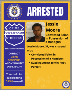 A rectangular poster with a blue and yellow background design. At the top, a wide blue banner displays the word “ARRESTED” in large white letters. On the left side of this banner is a circular seal labeled “City of Memphis Police Department.” Below the banner, on the left side of the poster, there is a large blue shield-shaped graphic with white text that reads: “CRIME STOPPERS 901‑528‑CASH.” Beneath the shield is the website “www.crimestopmem.org,” followed by additional white text: “CONTACT CRIME STOPPERS ANONYMOUSLY 901‑528‑2274 You could be eligible for a CASH reward!” To the right of the shield graphic, there is a rectangular photo showing one individual standing in front of a height chart background. To the right of the photo, black text reads: “Jessie Moore Convicted Felon in Possession of a Handgun Jessie Moore, 37, was charged with: • Convicted Felon in Possession of a Handgun • Evading Arrest to wit: Foot Pursuit” In the bottom right corner of the poster, there is a small circular Memphis Police Department seal.